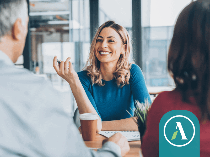 Smiling consultant with clients