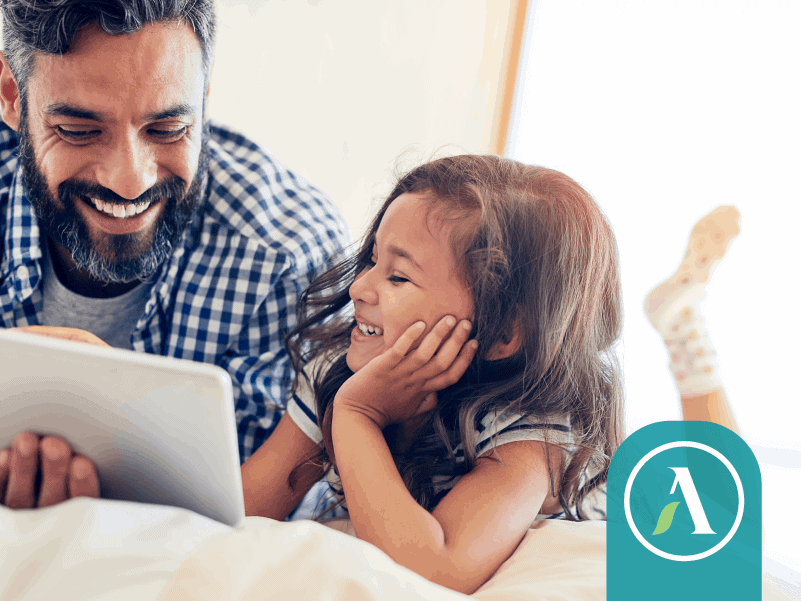 Father and daughter with ipad